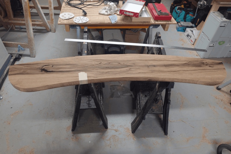 carved wooden shelf designed as bespoke joinery project