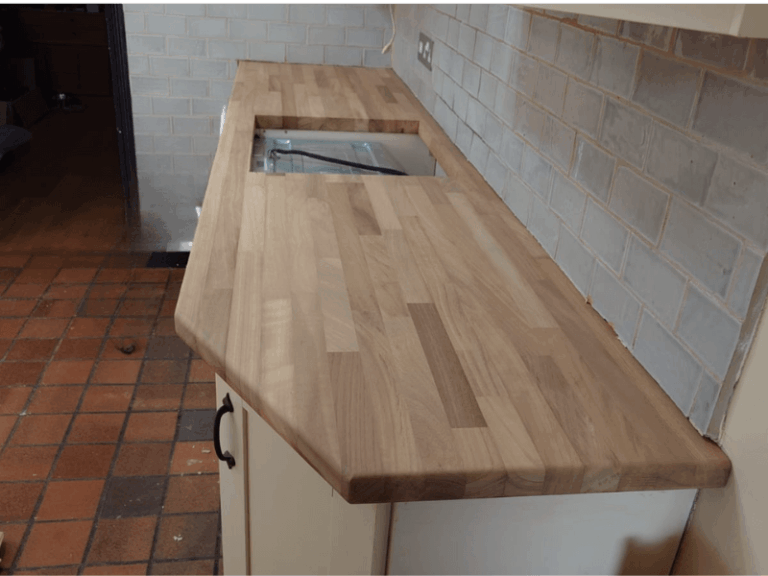 Iroko worktop installation with bespoke joint detailing