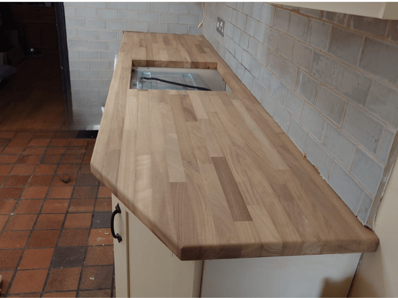 Iroko worktop installation with bespoke joint detailing