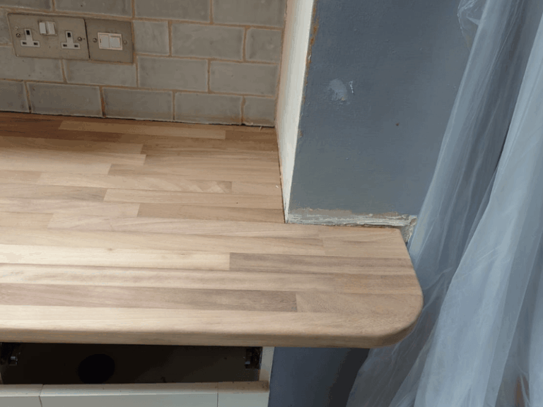 Bespoke Iroko kitchen worktop fitted with curved joint