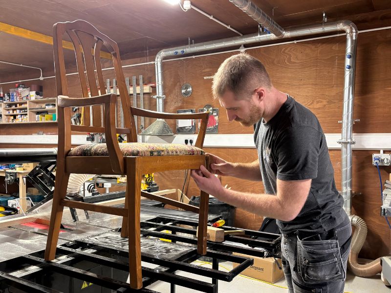 Alex from AM Joinery restoring a chair in Warwickshire