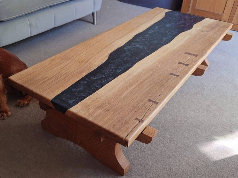 Live-edge oak tabletop with resin river and natural grain detail