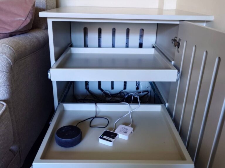 Bespoke media cabinet with pull-out storage drawers and ventilation
