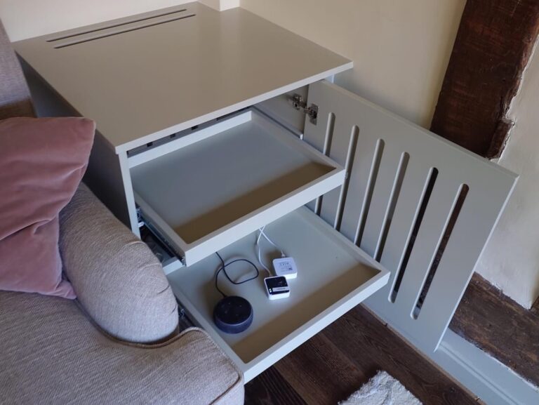 Custom media storage cabinet with integrated drawers and ventilated door
